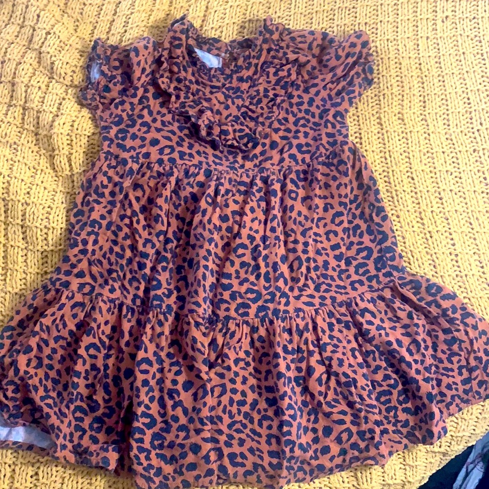Leopard print with ruffle front and bottom